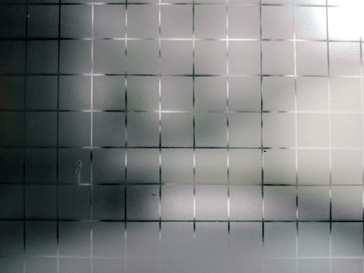 glass wall backgroundLarge bronze reflective glass window